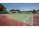 Two well-maintained tennis courts at 1211 N Mcmullen Booth Rd # 1211, Clearwater, FL 33759