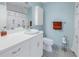 A well-lit bathroom with an updated vanity, a shower and toilet at 4115 34Th S Way # 195, St Petersburg, FL 33711