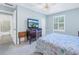 Bedroom with a full-size bed, dresser and access to bathroom at 4115 34Th S Way # 195, St Petersburg, FL 33711