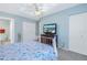 Bright bedroom showcasing sea life bedding, and a mounted television at 4115 34Th S Way # 195, St Petersburg, FL 33711