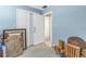A room with boxes, wood blocks, and a door that opens to another room at 4115 34Th S Way # 195, St Petersburg, FL 33711