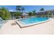 Community pool with steps and plenty of deck space at 4115 34Th S Way # 195, St Petersburg, FL 33711