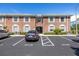 Brick building exterior with parking in front at 4115 34Th S Way # 195, St Petersburg, FL 33711