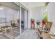 Relaxing balcony with glass doors and potted plants at 4115 34Th S Way # 195, St Petersburg, FL 33711