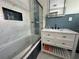 Updated bathroom with white vanity, marble floors, and a jetted tub at 224 6Th N Ave # 12, St Petersburg, FL 33701