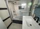 Updated bathroom with a soaking tub and modern vanity at 224 6Th N Ave # 12, St Petersburg, FL 33701