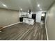 Open concept kitchen with modern appliances and sleek countertops at 224 6Th N Ave # 12, St Petersburg, FL 33701