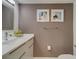 Modern bathroom with white vanity and gray walls at 105 4Th Ne Ave # 215, St Petersburg, FL 33701