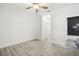 Bright bedroom with hardwood floors and access to bathroom at 2272 Chianti Pl # 4-0048, Palm Harbor, FL 34683