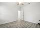 Spacious bedroom featuring light walls and wood-look floors at 2272 Chianti Pl # 4-0048, Palm Harbor, FL 34683