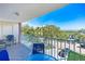 Private balcony offering scenic views and outdoor seating at 19610 Gulf Blvd # 308, Indian Shores, FL 33785