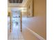Bright hallway with tile floors leading to living spaces at 19610 Gulf Blvd # 308, Indian Shores, FL 33785