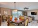 Bright dining area with large table and chairs, offering ample seating at 19610 Gulf Blvd # 308, Indian Shores, FL 33785