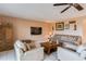Relaxing living room with comfortable sofas and a coffee table at 19610 Gulf Blvd # 308, Indian Shores, FL 33785