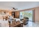 Comfortable living room with ample seating and access to balcony at 19610 Gulf Blvd # 308, Indian Shores, FL 33785