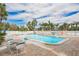 Relaxing community pool area with lounge chairs at 19610 Gulf Blvd # 308, Indian Shores, FL 33785