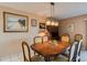 Condo dining room with wood table and six chairs at 19610 Gulf Blvd # 308, Indian Shores, FL 33785