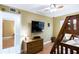 Bedroom with mounted TV, dresser, and bunk bed at 19610 Gulf Blvd # 308, Indian Shores, FL 33785