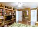 Bedroom with built-in shelving and mirrored closet doors at 19610 Gulf Blvd # 308, Indian Shores, FL 33785