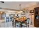 Open concept kitchen and dining area with breakfast bar and modern appliances at 19610 Gulf Blvd # 308, Indian Shores, FL 33785