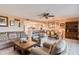 Spacious living area with open layout, comfortable seating, and kitchen view at 19610 Gulf Blvd # 308, Indian Shores, FL 33785