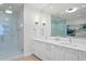 Spa-like bathroom with a double vanity and large walk-in shower at 301 1St S St # 3004, St Petersburg, FL 33701