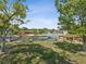 Waterfront backyard with dock and lush landscape at 5425 Waters Edge Dr, New Port Richey, FL 34653