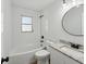 Updated bathroom with subway tile, granite vanity, and a new bathtub at 5425 Waters Edge Dr, New Port Richey, FL 34653
