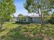 House exterior showcasing a large window at 5425 Waters Edge Dr, New Port Richey, FL 34653