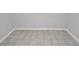 Empty bedroom with tile floor and white trim at 8214 Alafia Ridge Rd, Riverview, FL 33569