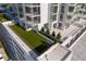 Artificial turf lawn with seating area next to building at 301 1St S St # 3004, St Petersburg, FL 33701