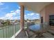 Spacious balcony overlooking the water with outdoor seating at 205 Brightwater Dr # 401, Clearwater Beach, FL 33767