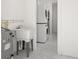 Laundry room with washer, dryer, and utility sink at 850 Mandalay Ave, Clearwater Beach, FL 33767