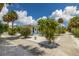 Cute bungalow style home with lush landscaping at 850 Mandalay Ave, Clearwater Beach, FL 33767