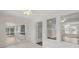 Sunroom with tile floors and views to other rooms at 850 Mandalay Ave, Clearwater Beach, FL 33767