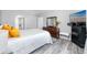Spacious bedroom with dresser, ocean view, and large bed at 420 64Th Ave # A, St Pete Beach, FL 33706