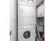 Stackable washer and dryer in a small closet at 420 64Th Ave # A, St Pete Beach, FL 33706