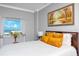Bedroom with ocean view, featuring a queen bed and soft pillows at 420 64Th Ave # A, St Pete Beach, FL 33706