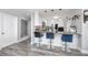 Modern kitchen with white cabinets and gray countertops at 420 64Th Ave # A, St Pete Beach, FL 33706