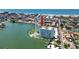 Aerial view showing building, parking, and waterfront access at 420 64Th Ave # A, St Pete Beach, FL 33706
