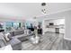 Open concept living room and kitchen with ocean view at 420 64Th Ave # A, St Pete Beach, FL 33706