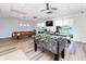 Community recreation room with foosball, pool table, and TV at 420 64Th Ave # A, St Pete Beach, FL 33706