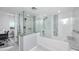 Updated bathroom with walk-in shower and bathtub at 420 64Th Ave # A, St Pete Beach, FL 33706