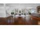 Elegant lobby with hardwood floors, a grand staircase, and a chandelier at 6 Hibiscus Ln, Belleair, FL 33756