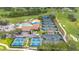 Resort-style community with pool, tennis courts, and pickleball courts at 6 Hibiscus Ln, Belleair, FL 33756