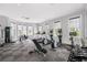 Well-equipped fitness center with treadmills, ellipticals, and weight machines at 6 Hibiscus Ln, Belleair, FL 33756
