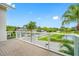 Private balcony overlooking a lush green landscape at 6 Hibiscus Ln, Belleair, FL 33756