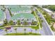 Aerial view of a luxurious townhome community with green roofs at 6 Hibiscus Ln, Belleair, FL 33756
