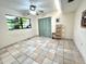 Bedroom with neutral paint, ceiling fan, and closet storage at 1964 Arvis E Cir, Clearwater, FL 33764