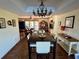Open dining room with view to the living room and with view to screened in lanai at 1964 Arvis E Cir, Clearwater, FL 33764